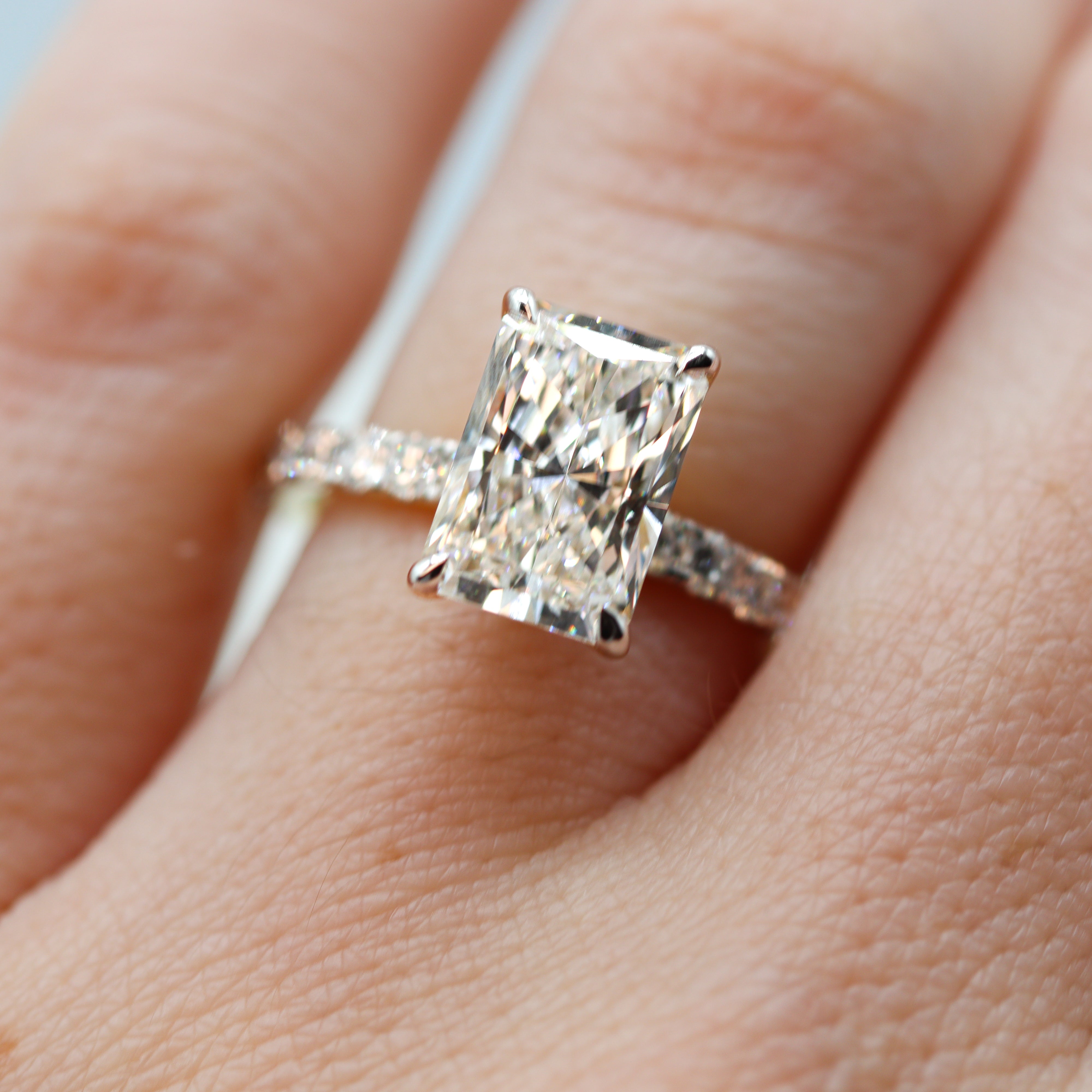 14K Yellow Gold Radiant-Cut Lab-Grown Diamond Accented Engagement Ring on a hand