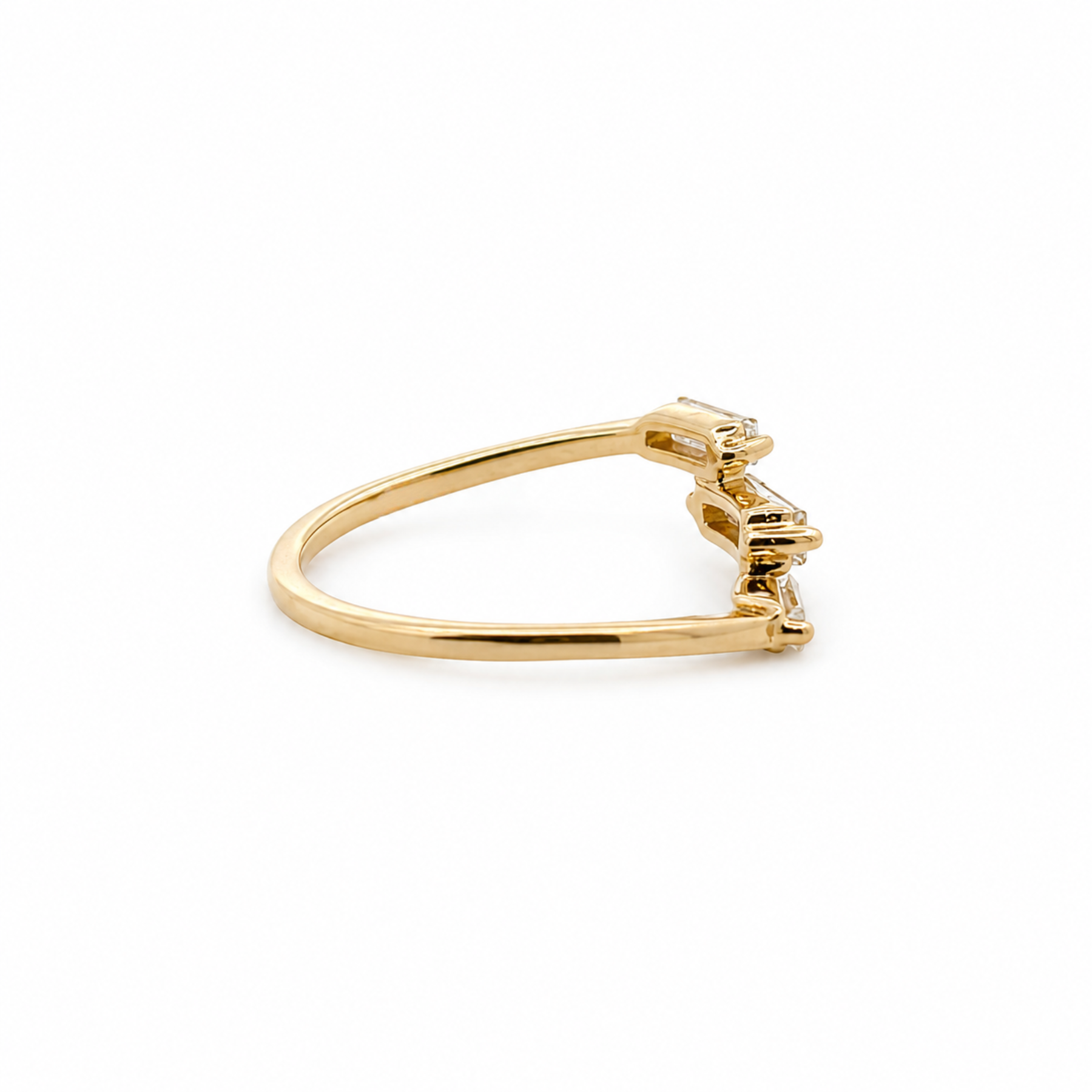 14k Yellow gold ring on a white background 
