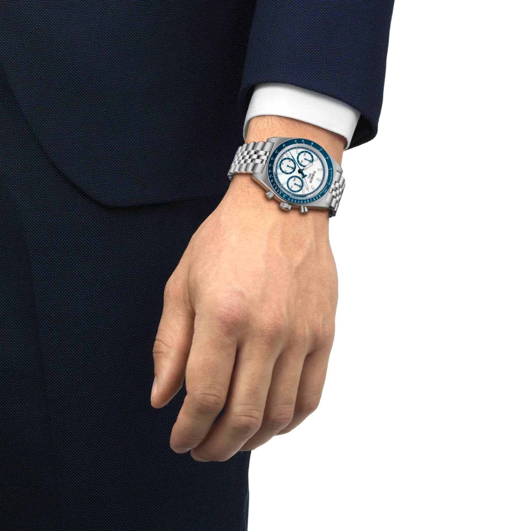 Hand wearing a silver watch with a blue face on a white background