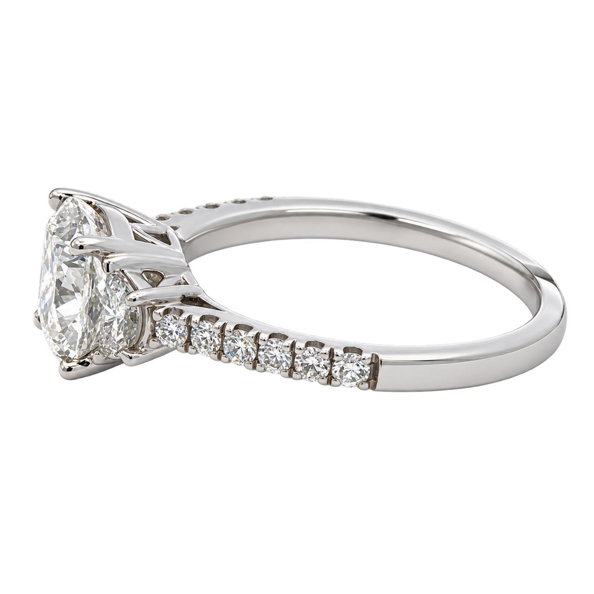 Left side view of LEGR-1898 14K white gold engagement ring showing the raised cushion-cut center diamond, side stone, prongs, and diamond-set shoulder.