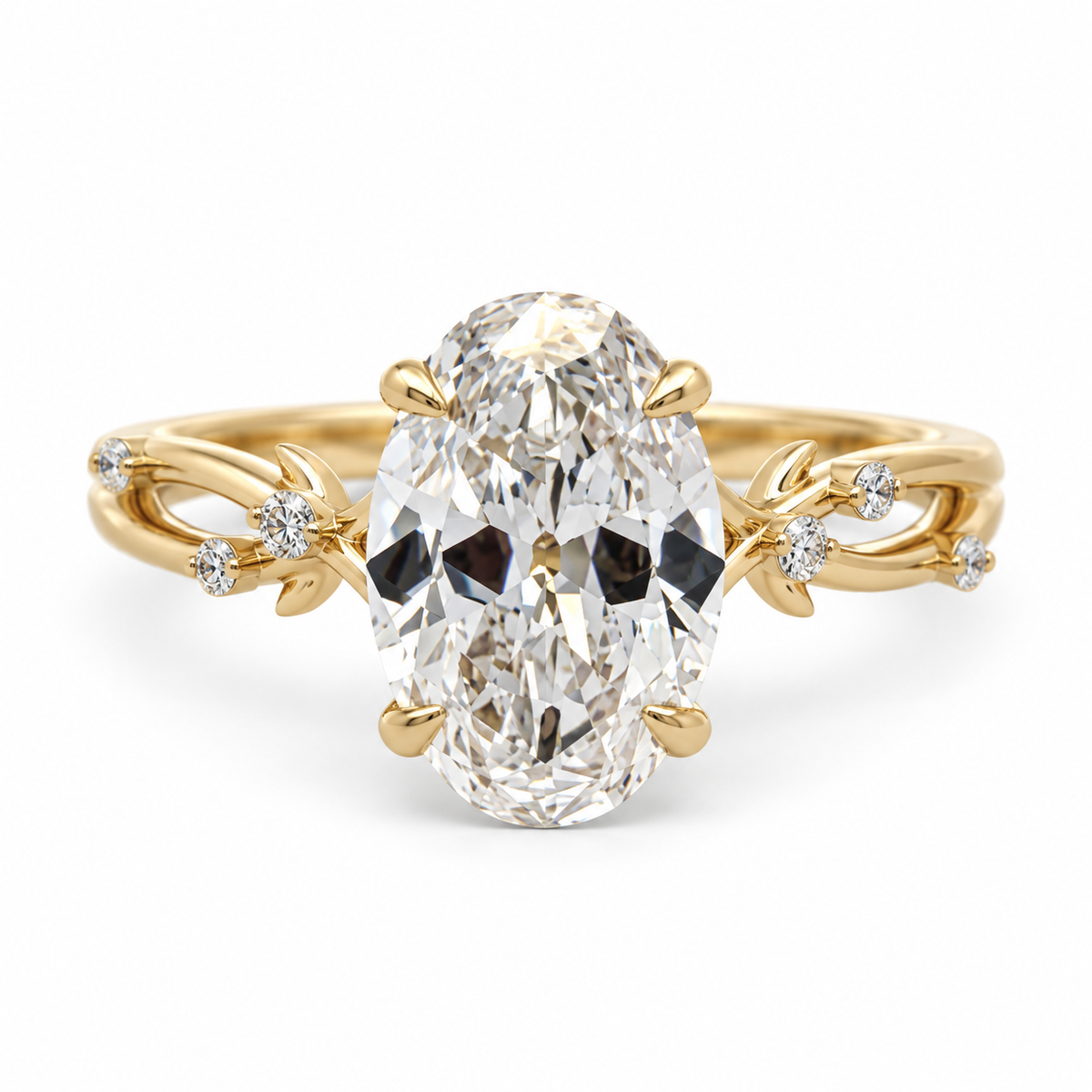 Front view of a 14K yellow gold 3.12CTW. diamond engagement ring with an oval lab-grown center diamond and vine-style accented shoulders.