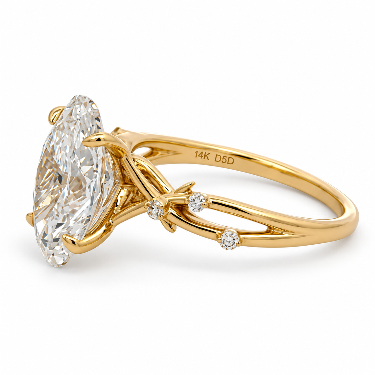 Opposite side view of the 14K yellow gold oval diamond ring showing the prong setting, diamond-accented shoulder and 14K hallmark.