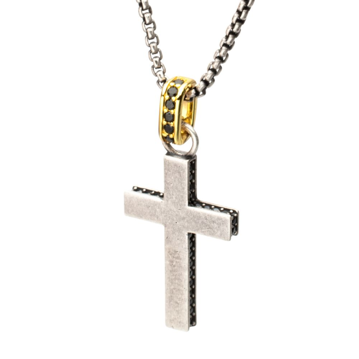 Silver cross pendant with gold accents on a white background