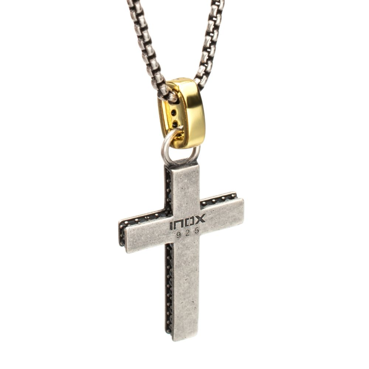 Cross pendant necklace with gold accent on a white background