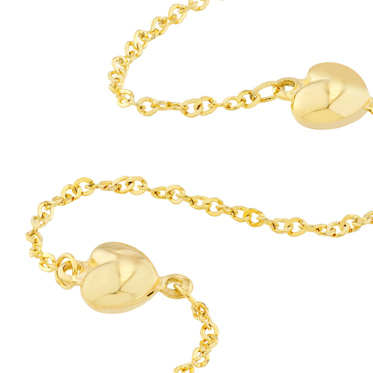 upclose of hearts on 14K Yellow Gold Puffy Heart Station Trio Bracelet