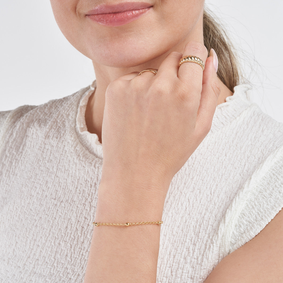 Model picture 14K Yellow Gold 3mm Diamond-Cut Bead Station Bracelet