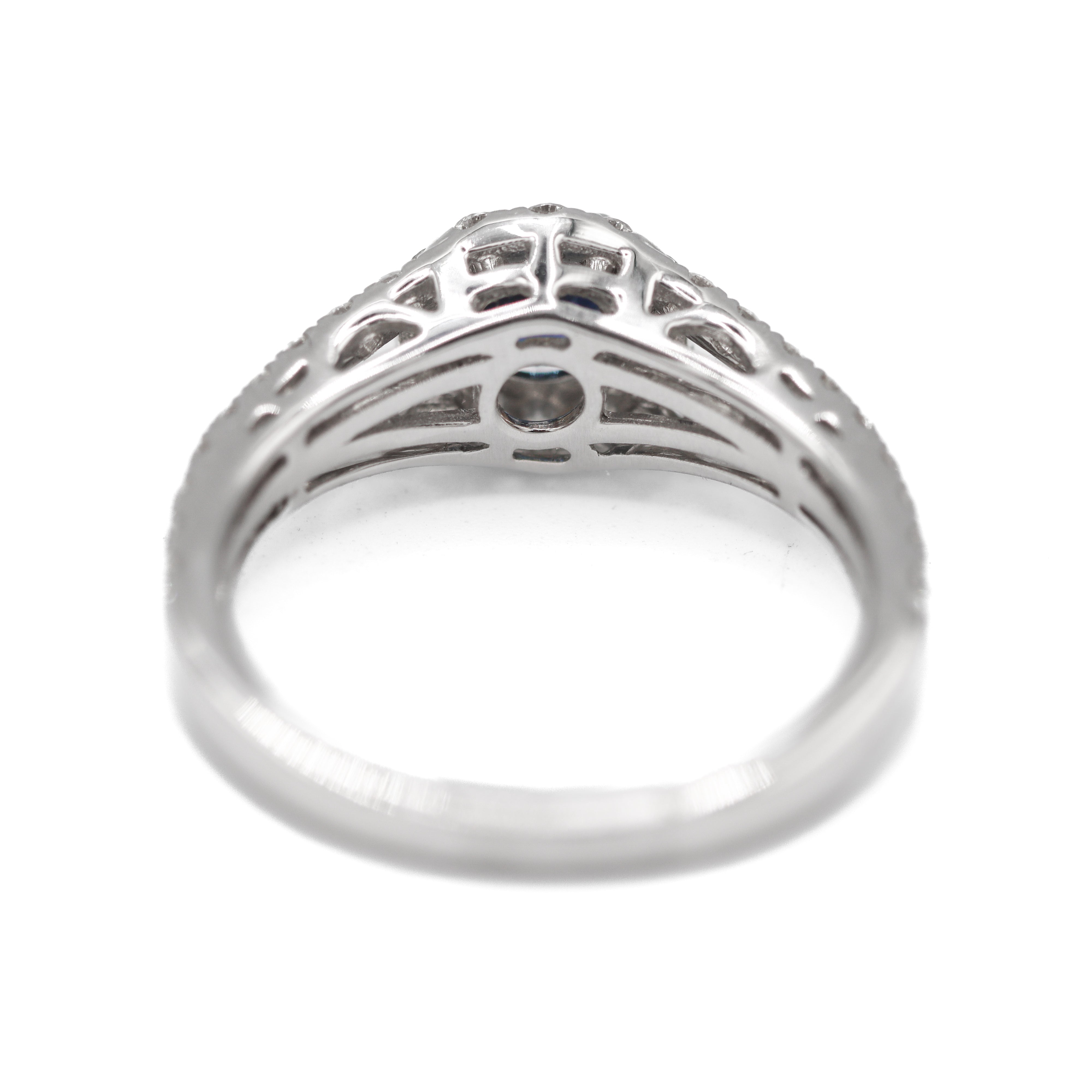 Back side view of 18K White Gold 5/8CT. Sapphire with 3/4CT. Diamond Halo Split-Shank Engagement Ring on white background.