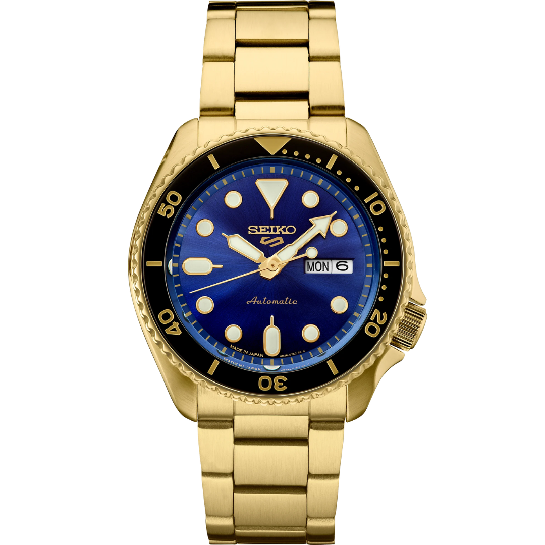SEIKO MEN'S 5 SPORTS Automatic Blue-Dial & Gold-Tone Case Watch on transparent background.