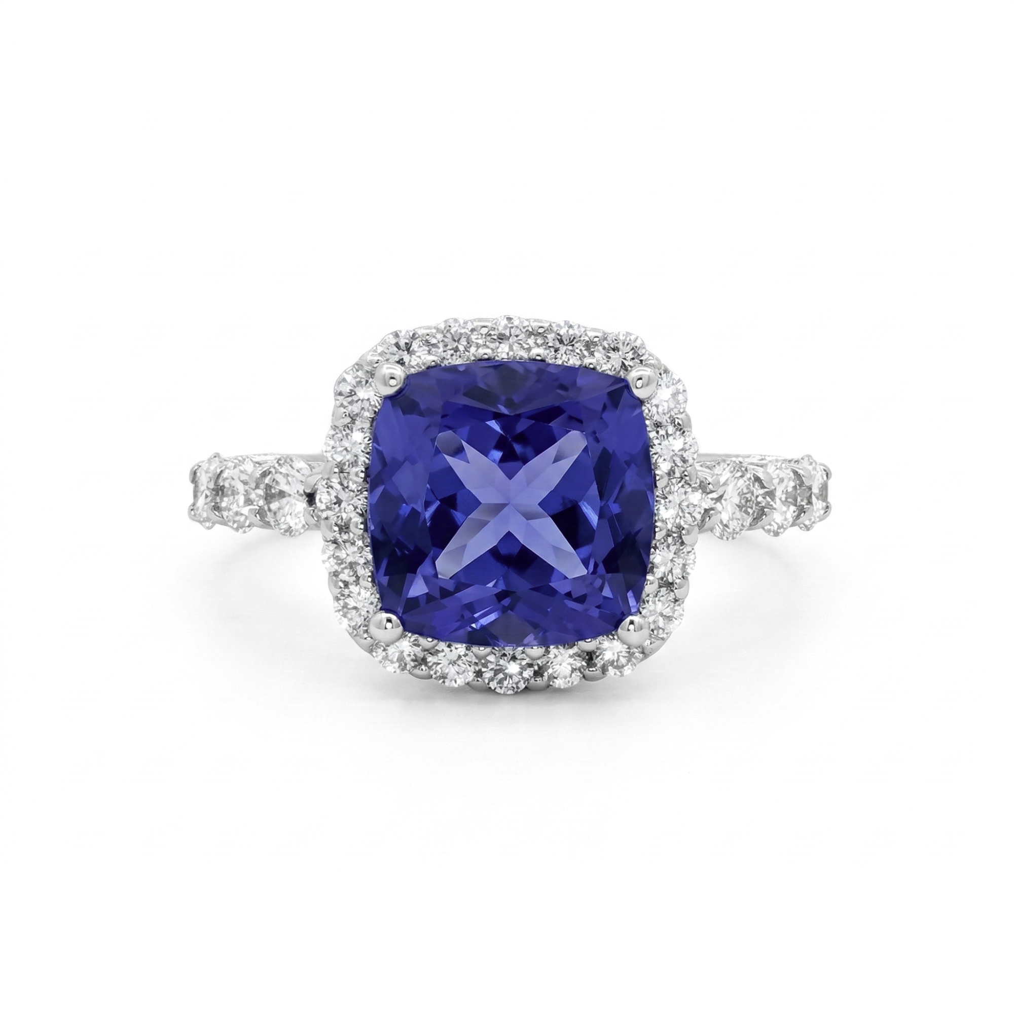18K White Gold 2.95CT. Tanzanite and 0.92CTW. Diamond Halo Accented Ring