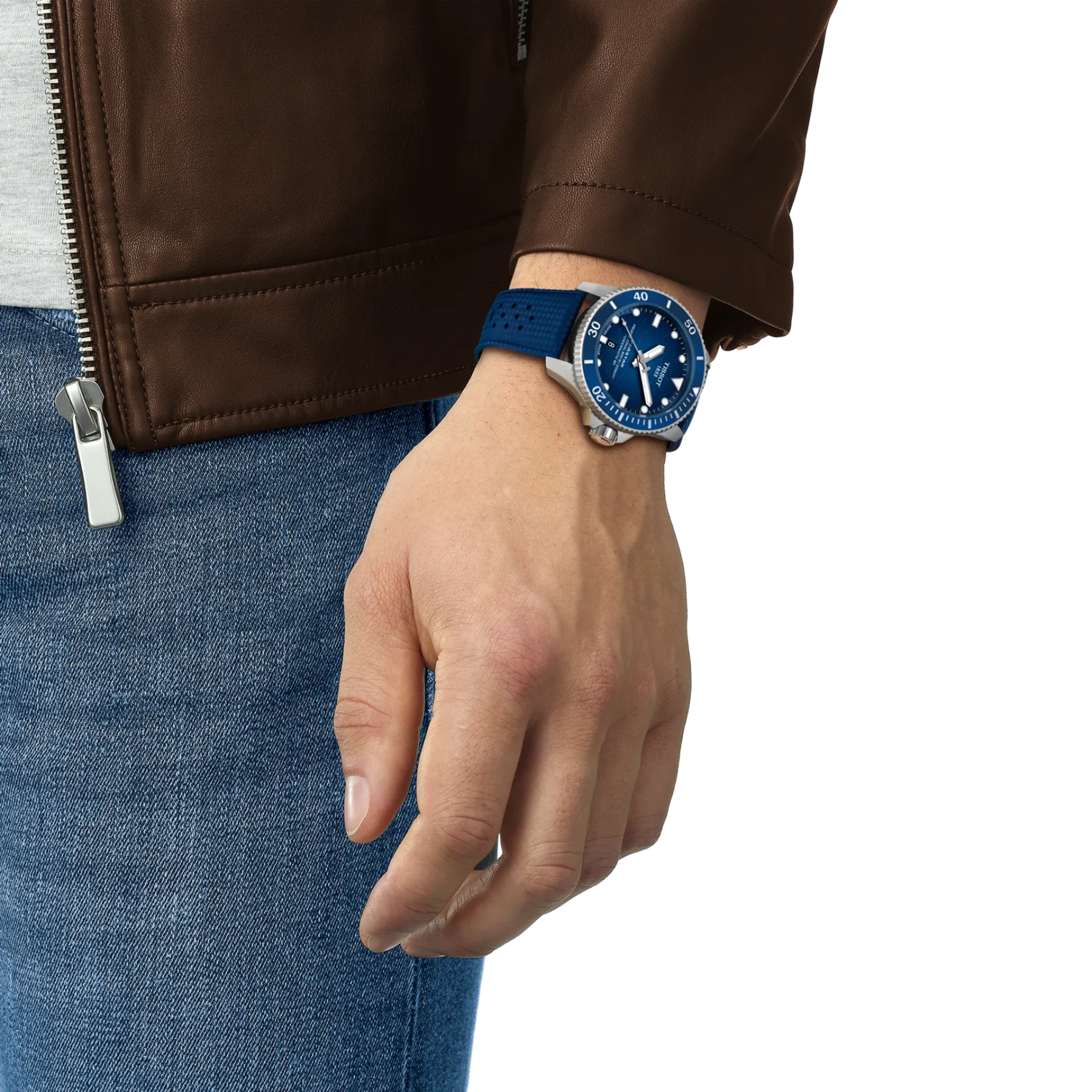 Hand wearing a blue watch with a brown jacket and jeans on a white background