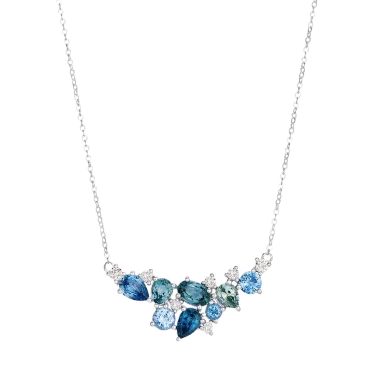 A silver-toned necklace featuring a curved cluster of faceted blue and green gemstones with small clear accent stones, shown on a plain white background.