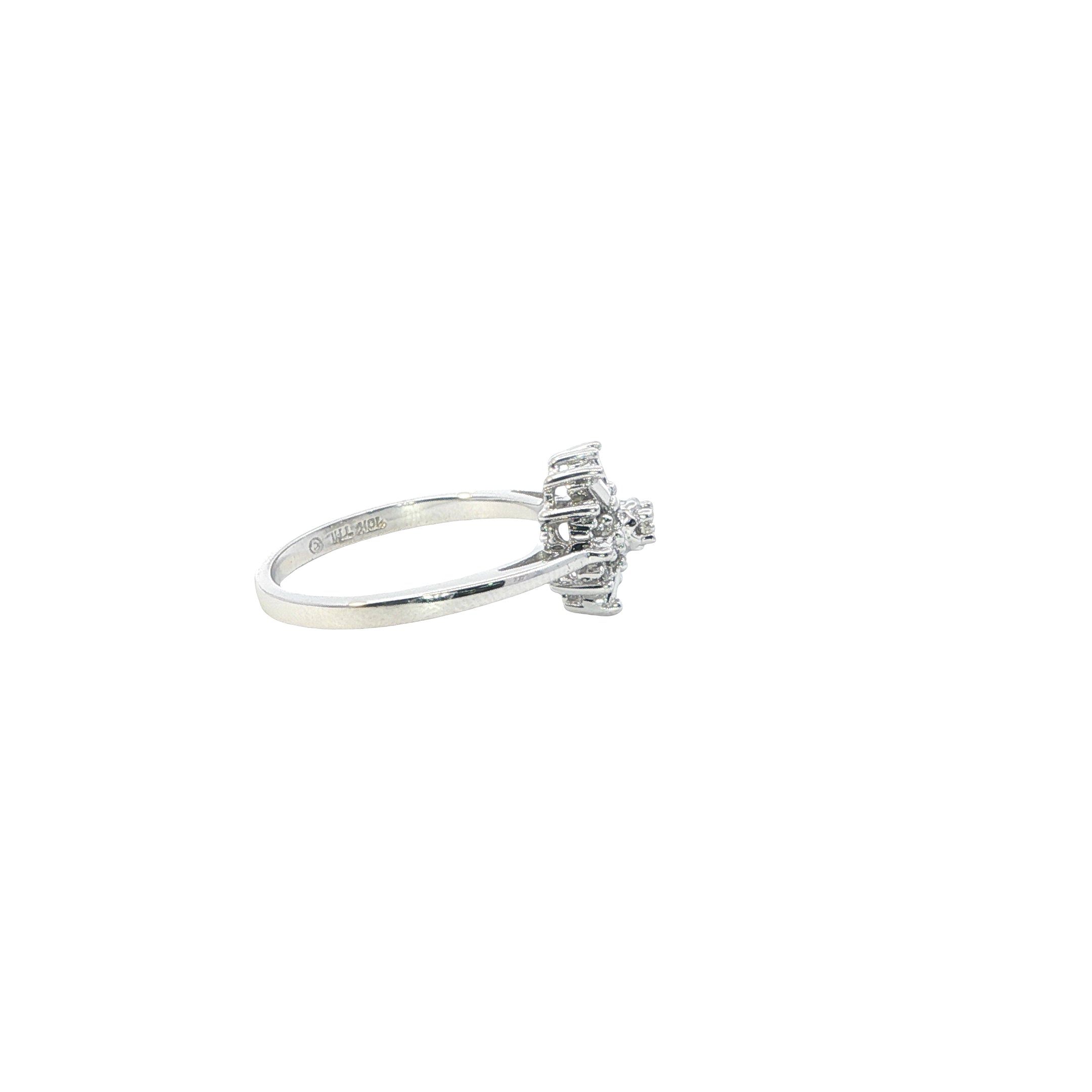 Silver ring with a small diamond on a white background