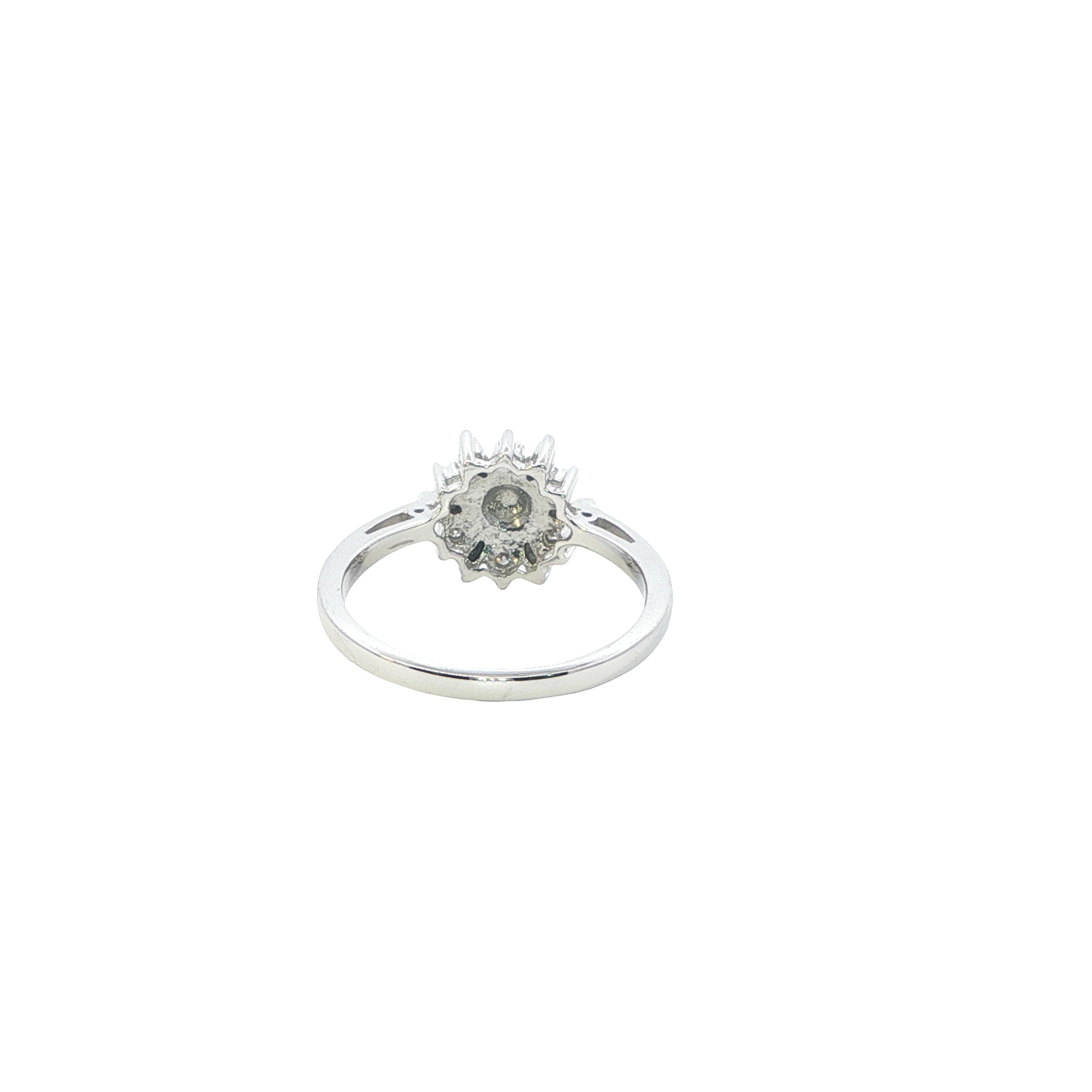Silver ring with a diamond on a white background