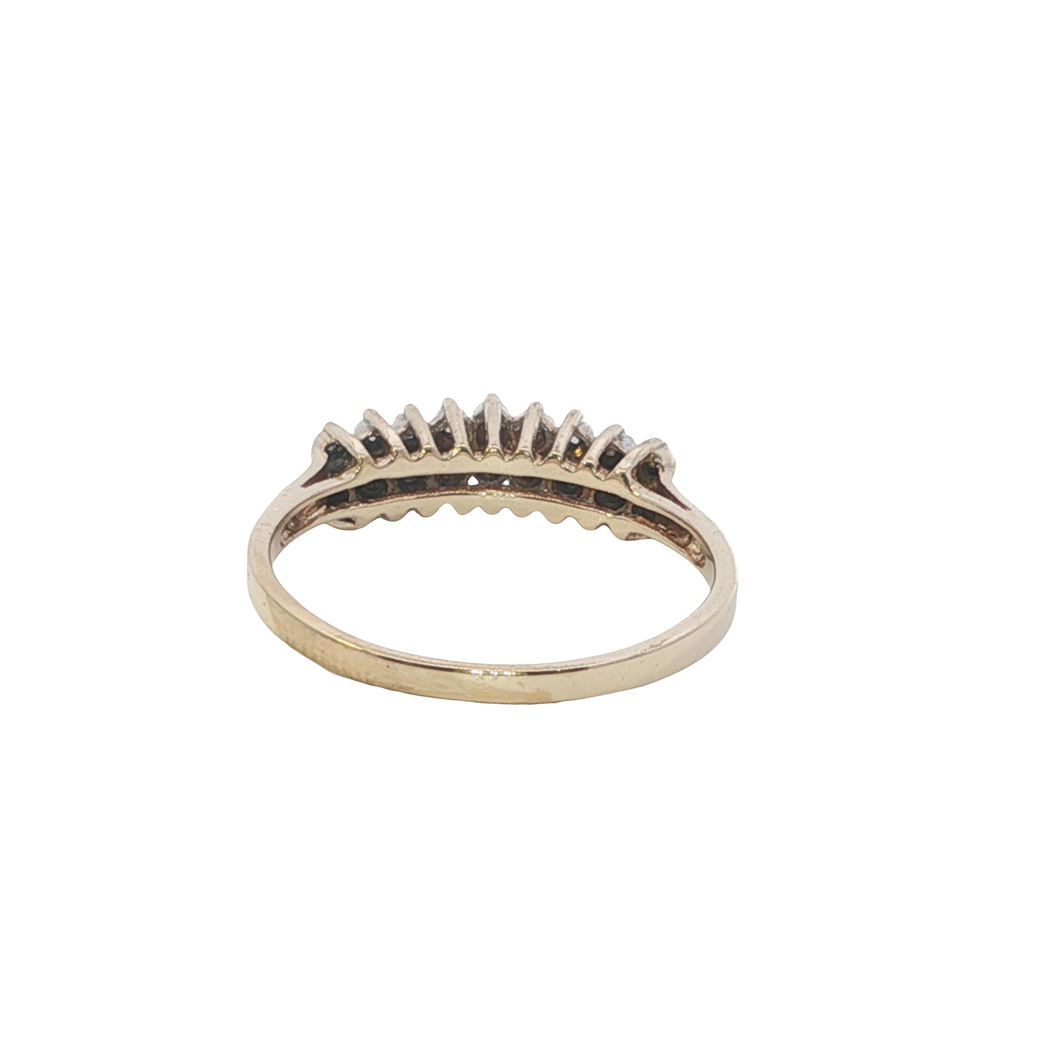 Gold ring with small stones on a white background