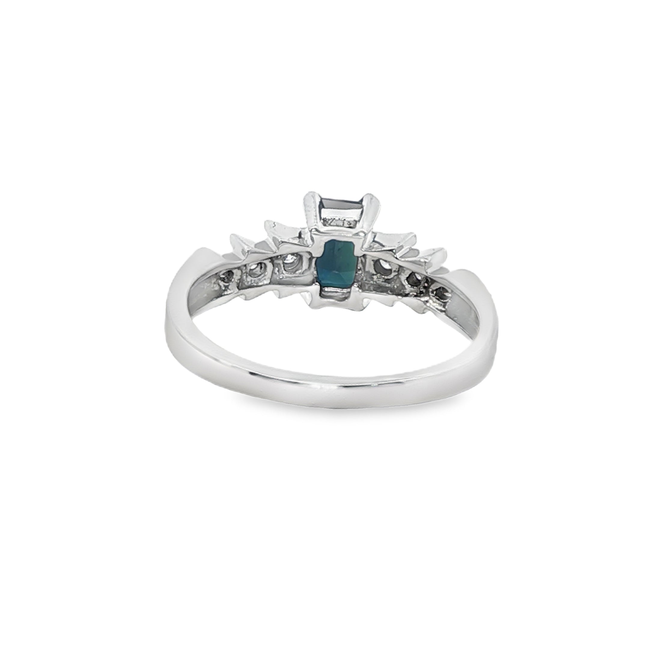 Silver ring with a central blue gemstone and diamond accents on a white background