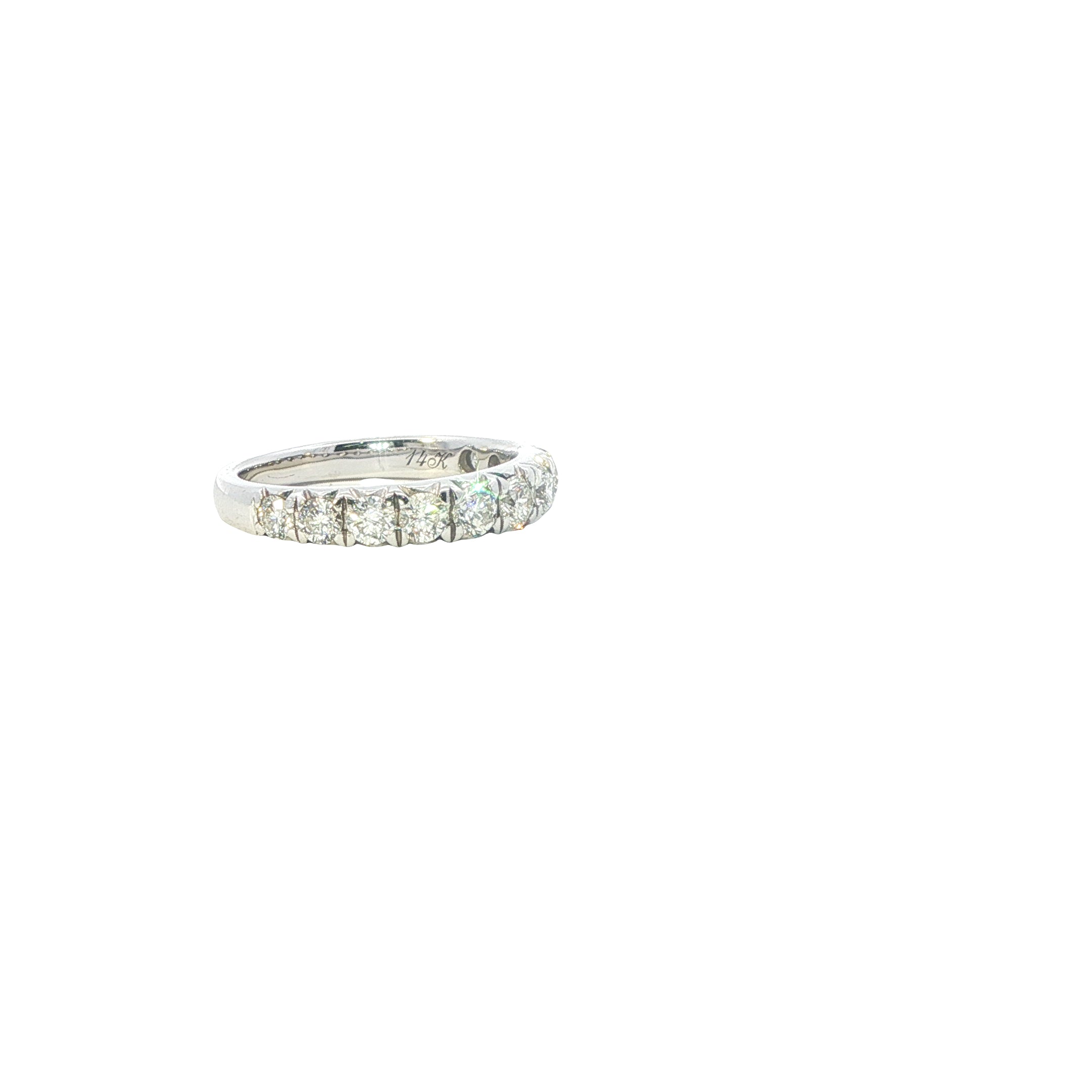 Silver ring with clear gemstones on a white background
