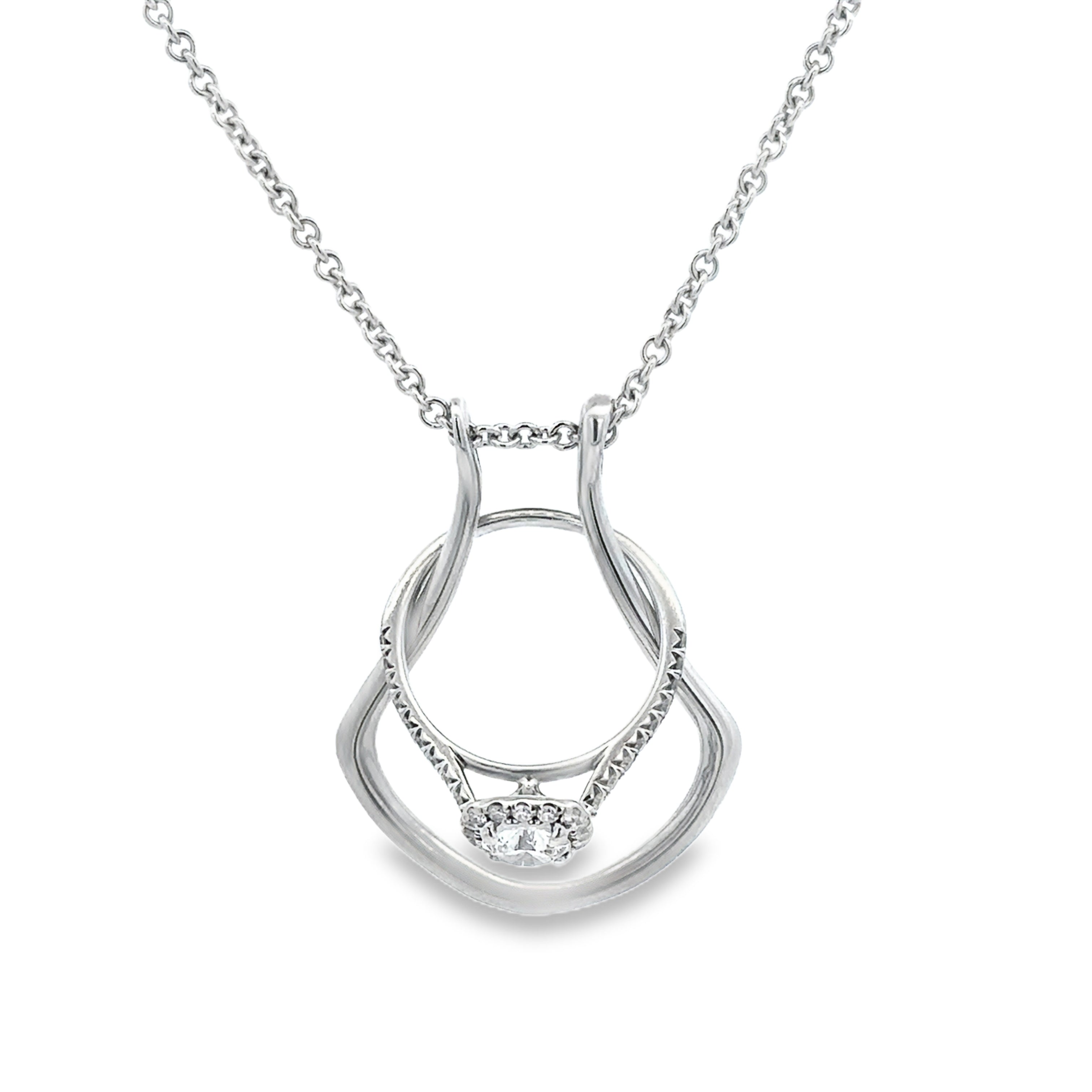 Silver necklace with a heart-shaped pendant on a white background