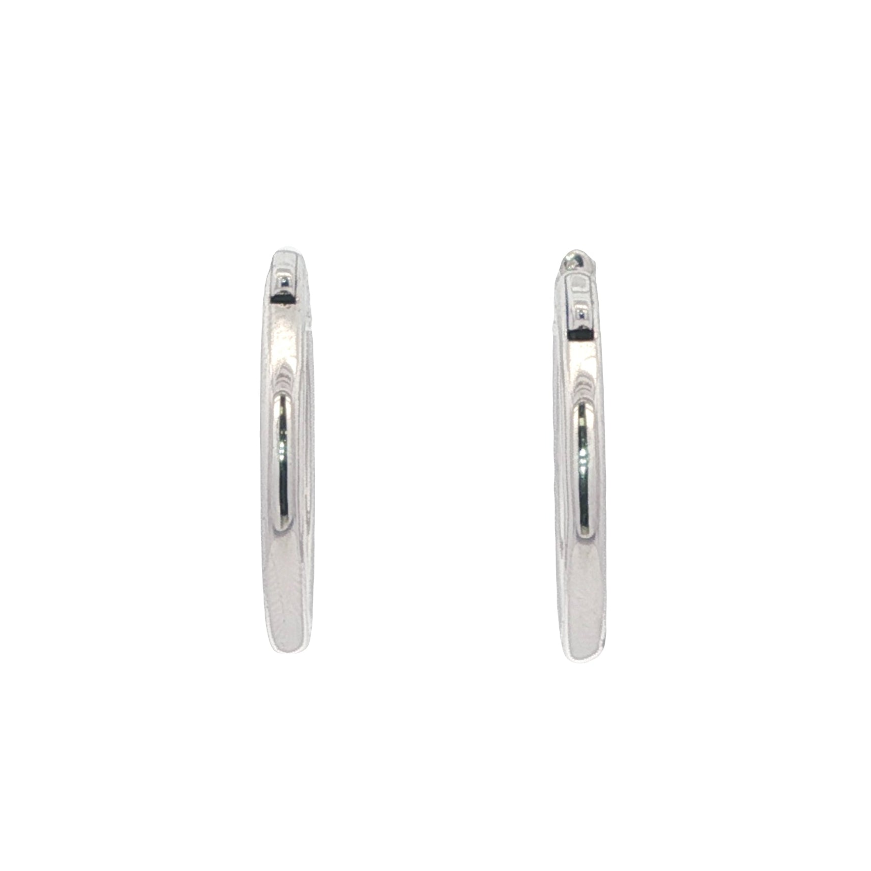 back view of white gold earrings on a white background
