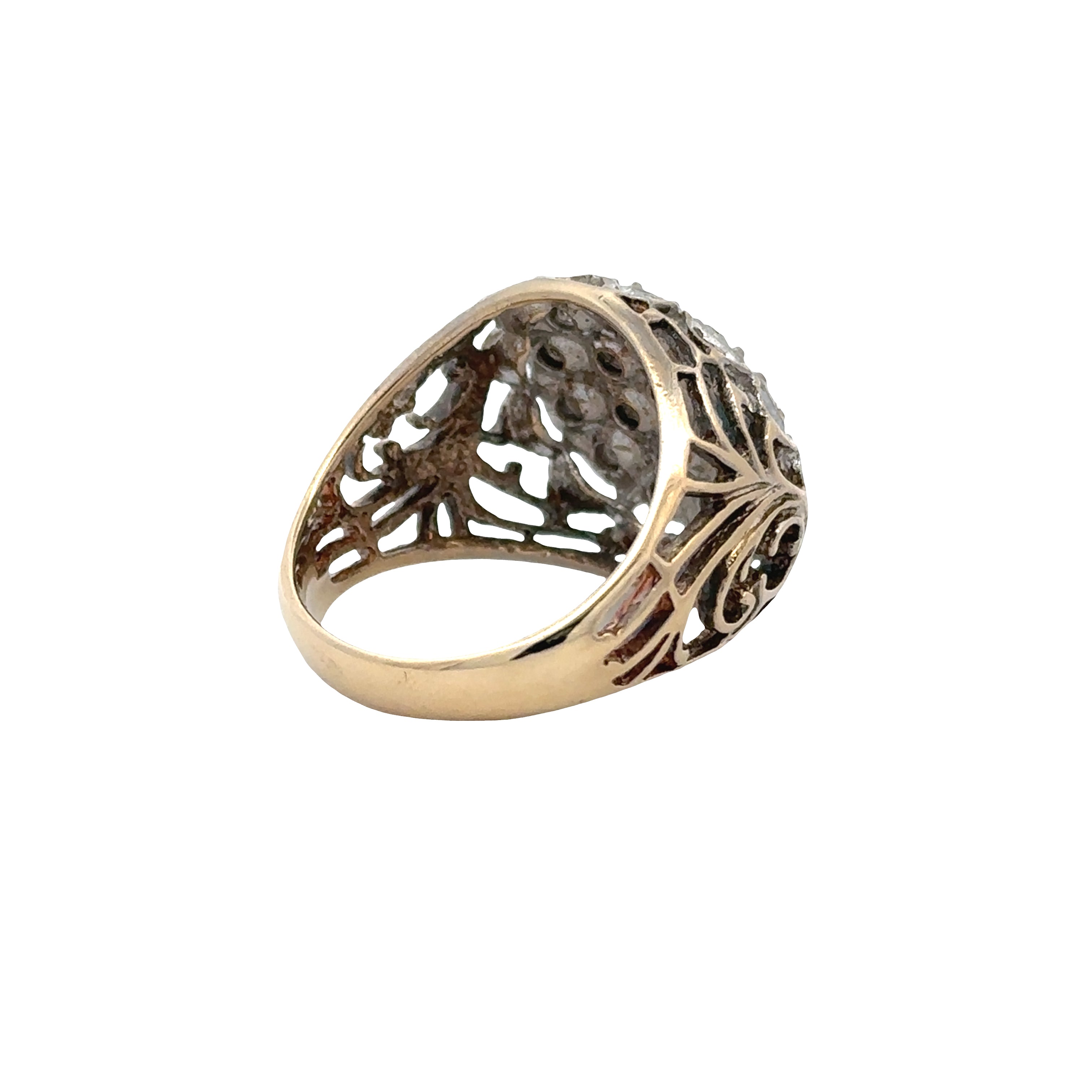 Gold ring with intricate design on a white background