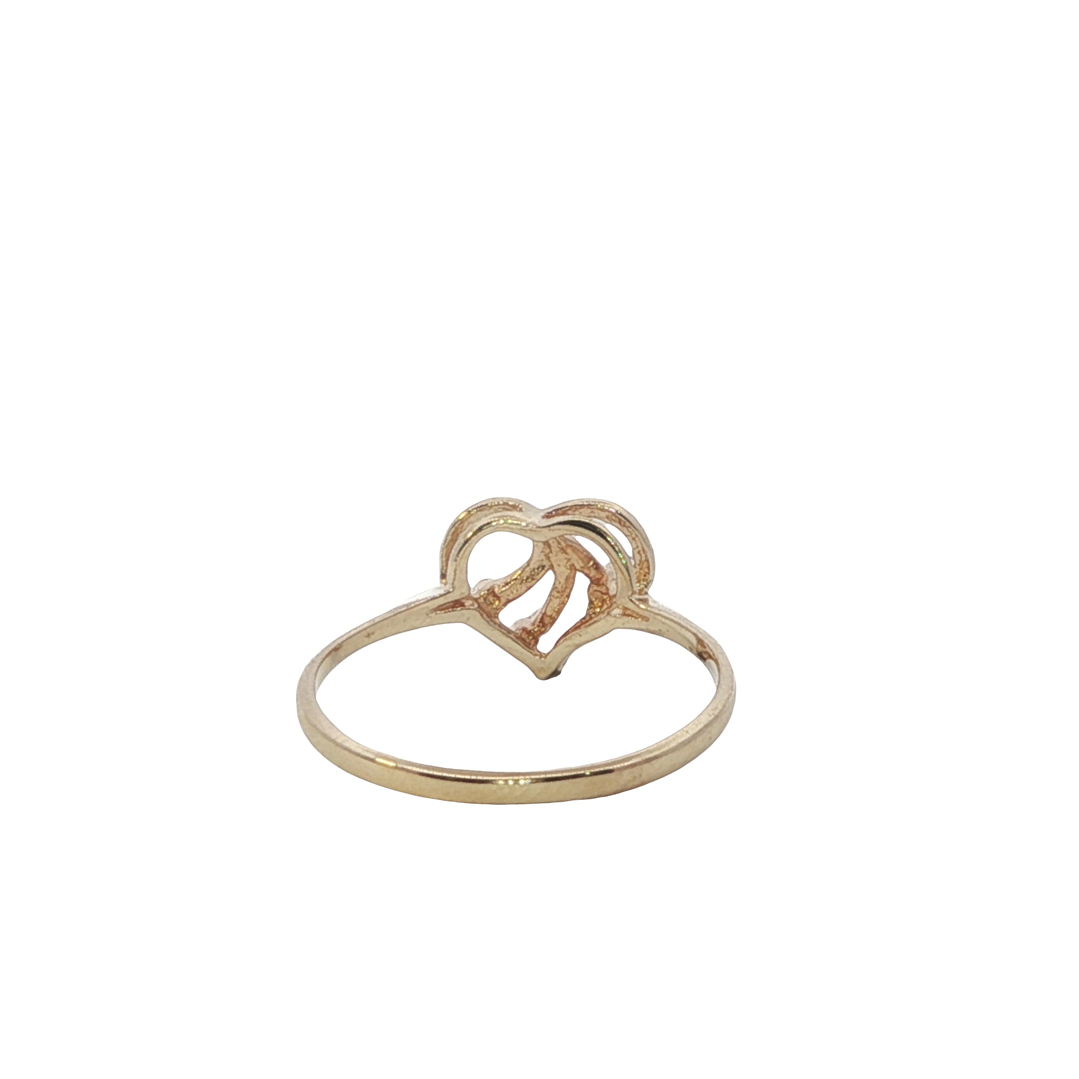 Gold ring with a heart design on a white background