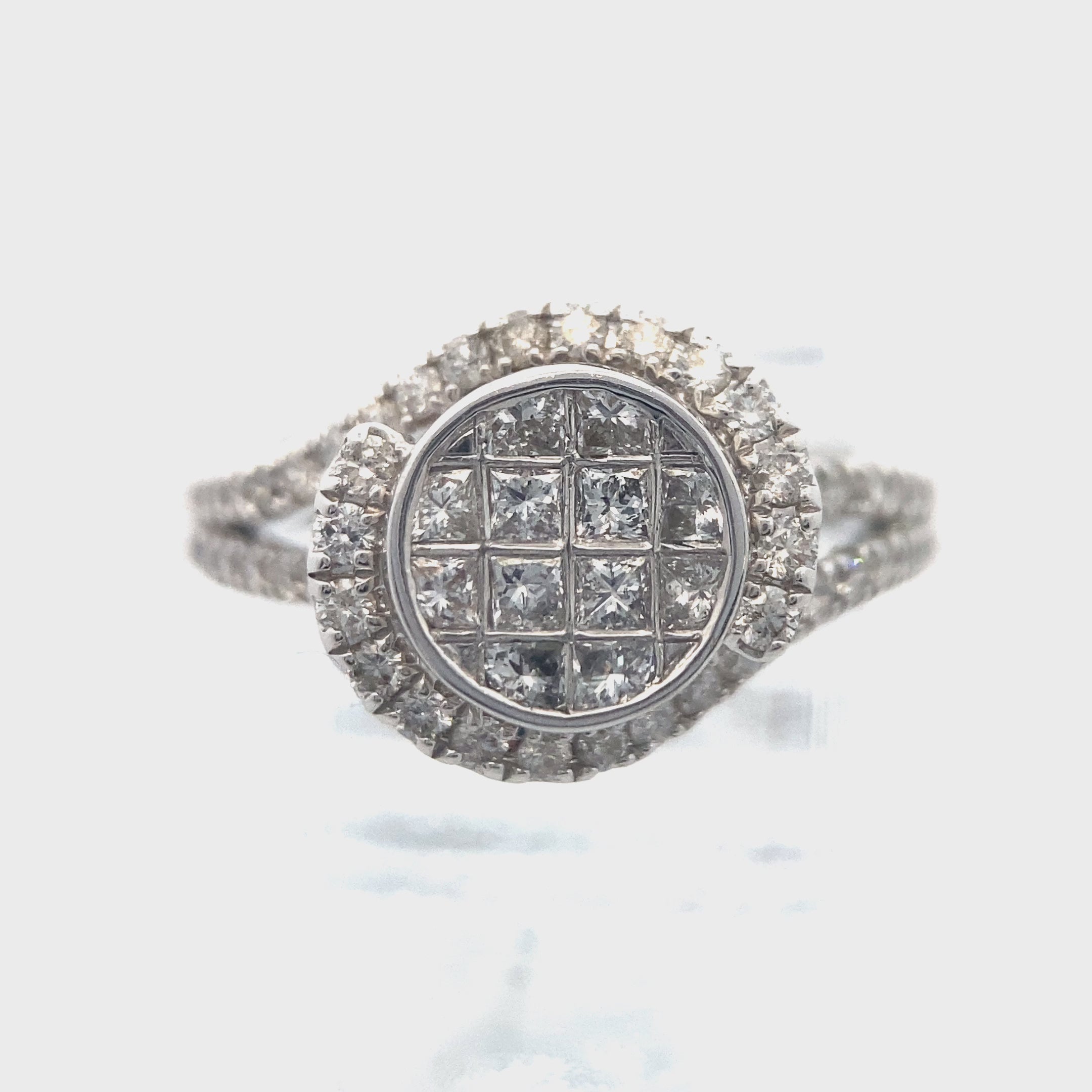 Video showing round halo invisible-set natural diamonds cluster ring.