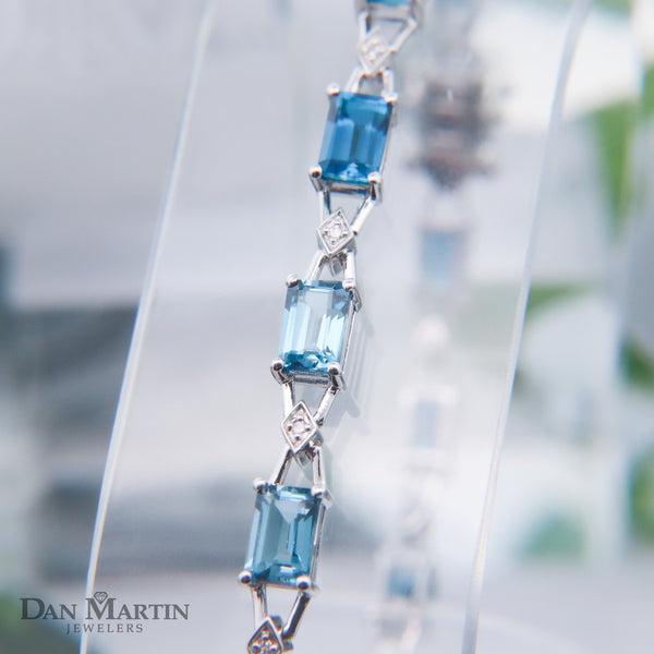 Sterling Silver 11CT. London Blue Topaz & 1/10CT. Diamond Baguette Link Bracelet