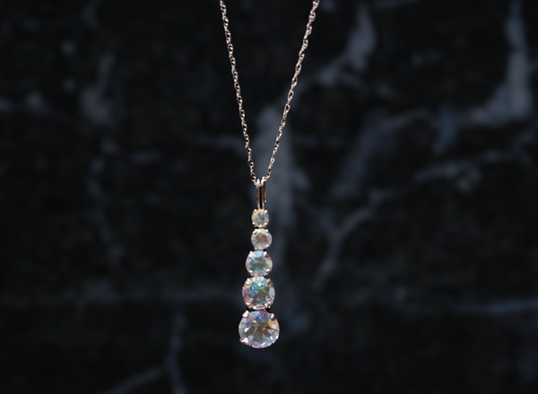 10K White Gold Graduated Mystic Topaz Necklace